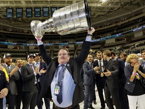 Clark Donatelli has his moment with the Stanley Cup after the Penguins won the title in 2016. Donatelli, then their minor-league head coach, has been accused of groping the wife of an assistant coach in '18.