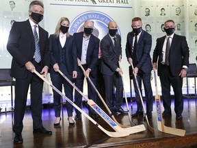 This year’s six Hockey Hall of Fame inductees received their rings at a ceremony yesterday at the Hockey Hall Grand Hall in Toronto: Pictured left to right are players Doug Wilson, Kim St-Pierre, Kevin Lowe, Jarome Iginla, Marian Hossa and Ken Holland for the builders category. Jack Boland/Toronto Sun