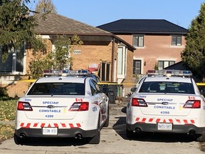 Toronto Police at the scene of a homicide at Ellesmere and Meadowvale Rds. on Nov. 12, 2021.