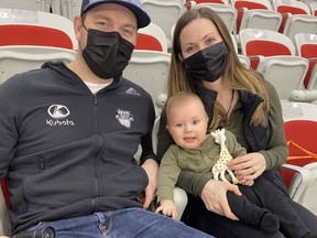 Geoff and Laura Walker and their baby Liam.