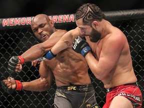 Kamaru Usman (L) fights Jorge Masvidal during their welterweight title bout at UFC 261 at VyStar Veterans Memorial Arena on April 25, 2021 in Jacksonville, Florida.