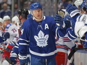 Maple Leafs' Morgan Rielly celebrates one of his two goals against the Rangers on Thursday, Nov. 18, 2021.