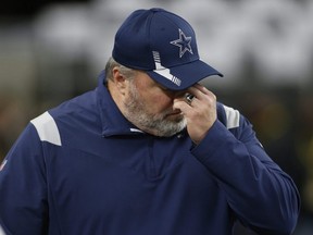 Cowboys head coach Mike McCarthy walks on the field before a game against the Raiders at AT&T Stadium in Arlington, Texas, Nov. 25, 2021.