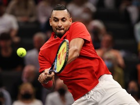 Nick Kyrgios of Team World plays a shot against Stefanos Tsitsipas of Team Europe during the fifth match during Day 2 of the 2021 Laver Cup at TD Garden on Sept. 25, 2021 in Boston, Massachusetts.