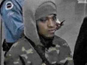 An image released by Toronto Police of a suspect sought in a stabbing on Wednesday, Nov. 24, 2021 Richmond and York Sts.