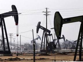Petroleum pump jacks are pictured in the Kern River oil field in Bakersfield, California November 9, 2014.