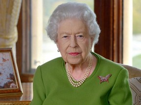 An undated Buckingham Palace handout image shows a video grab taken from Queen Elizabeth II's video message, which was played during a welcoming reception at the COP26 UN Climate Summit in Glasgow, Nov. 1, 2021.