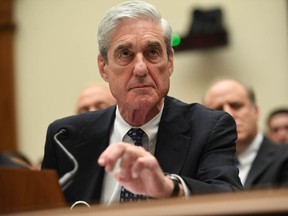 In this file photo taken on July 24, 2019 former Special Prosecutor Robert Mueller testifies before Congress in Washington, DC.