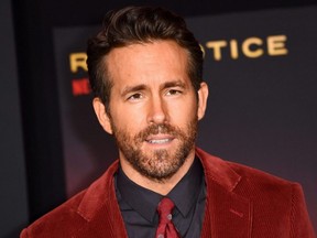 Canadian actor Ryan Reynolds attends the world premiere of Netflix's "Red Notice" at LA Live in Los Angeles, Wednesday, Nov. 3, 2021.