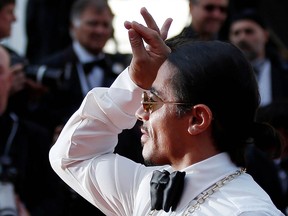 Nusret Gokce, known as Salt Bae, poses at the 72nd Cannes Film Festival.