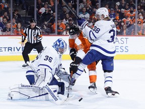 Maple Leafs' Jack Campbell and Rasmus Sandin block a shot by Flyers' Joel Farabee during the second period at Wells Fargo Center on Wednesday, Nov. 10, 2021 in Philadelphia.
