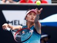 A file photo of China’s Peng Shuai serving during a match at the Australian Open on Jan. 15, 2019.
