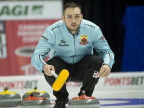 Skip Tanner Horgan of Kingston, Ont. looks on during Draw 4 against Team Bottcher.