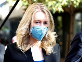 Theranos founder Elizabeth Holmes leaves after attending her fraud trial at federal court in San Jose November 22, 2021.