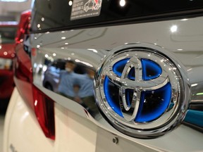 This file photo taken on August 6, 2020 shows a car emblem for Toyota Motor at a company showroom in Tokyo.