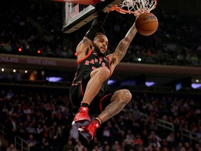 Toronto Raptors guard Gary Trent Jr. (33) dunks against the New York Knicks during the first quarter at Madison Square Garden.