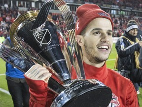 Sebastian Giovinco celebrates with the Cup after Toronto FC winning MLS Cup in Toronto, Ont. on December 9, 2017.