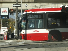 A TTC bus exits the Victoria Park subway station on Tuesday, Nov. 16, 2021.