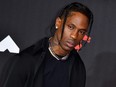Rapper Travis Scott arrives for the 2021 MTV Video Music Awards at Barclays Center in Brooklyn, N.Y., Sept. 12, 2021.