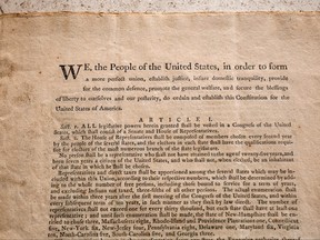 A 1787 copy of the United States Constitution that sold for $43.2 million, a new world record for the most valuable historical document ever sold at an auction, at Sotheby's in the Manhattan borough of New York City, Sept. 9, 2021.