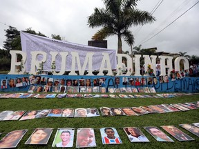 Pictures of victims are seen during a ceremony to mark one year of the disaster of the tailing dam owned by Brazilian mining company Vale SA in Brumadinho, Minas Gerais state, Brazil January 25, 2020.