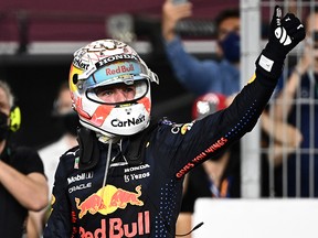 Second placed Max Verstappen of Netherlands and Red Bull Racing celebrates in parc ferme during the F1 Grand Prix of Qatar at Losail International Circuit on November 21, 2021 in Doha, Qatar.