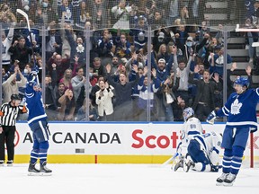 Maple Leafs' William Nylander (88) celebrates scoring the winner in overtime against the Tampa Bay Lightning at Scotiabank Arena on Thursday, Nov. 4, 2021.