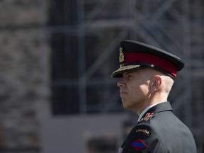 CP-Web.  Lieutenant-General Wayne Eyre listens to speakers during a change of command parade for the Canadian Army on Parliament Hill Tuesday, August 20, 2019 in Ottawa.