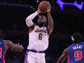 Los Angeles Lakers forward LeBron James (6) shoots the ball against the Detroit Pistons  in the second half at Staples Center.