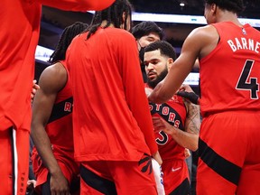 Nov 19, 2021; Sacramento, California, USA; Toronto Raptors guard Fred VanVleet (23) celebrates with teammates after scoring a basket in the final seconds of the second quarter against the Sacramento Kings at Golden 1 Center. Mandatory Credit: Kelley L Cox-USA TODAY Sports