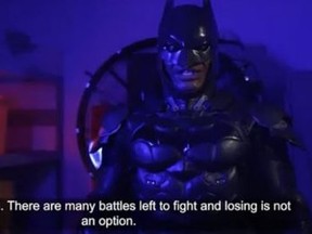 An image from a controversial video, featuring Dr. Lawrence Loh, Peel Regions medical officer of health, and Brampton Batman