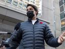 Canada's Prime Minister Justin Trudeau leaves a pharmacy after receiving his seasonal flu vaccine in Ottawa, Ontario, November 5, 2021.  