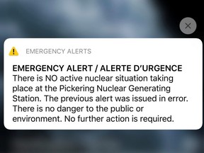 A provincial emergency alert announcing an error in a previous alert regarding the Pickering Nuclear Generating Station appears on a mobile phone screen in Toronto, Jan. 12, 2020.