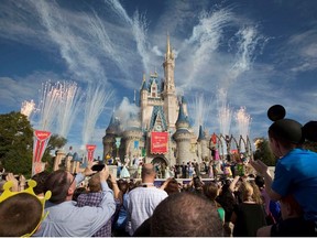 Fireworks go off around Cinderella's castle during the grand opening ceremony for Walt Disney World's Fantasyland in Lake Buena Vista, Florida December 6, 2012.