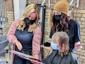 “There are a lot of clients, but not a lot of hairstylists,” said Melissa Hellam, left, owner of Salon Goulart near Dundas and Ossington. “They’re all kind of doing their own thing from home.”
