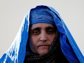 Sharbat Gula, the green-eyed "Afghan Girl" whose 1985 photo in National Geographic became a symbol of her country's wars, arrives to meet with Afghanistan's President Ashraf Ghani in Kabul, Afghanistan November 9, 2016.