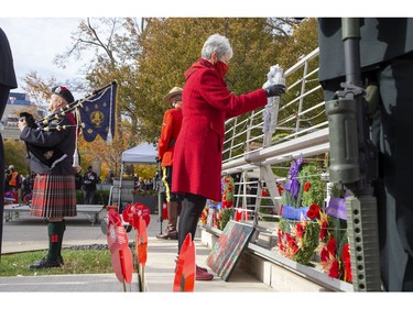London's Silver Cross Mother Carolyn Wilson lays a wreath during the Remembrance Day service at the cenotaph in London, Ont., Nov. 11, 2021.