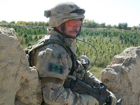 Mark Popov, then a major, is shown in this photo during a patrol in Kandahar province in Afghanistan in 2009.