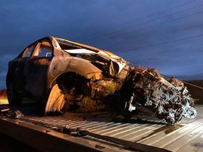 Onlookers recorded video of two teens in a vehicle after it crashed into a tree and burst into flames at County Rd. 27 and Horseshoe Valley Rd., in Springwater, on Sunday, Oct. 31, 2021.