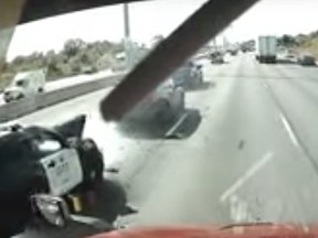 Dashcam video captured an OPP vehicle slamming into another car from behind on the QEW near Bronte Rd. on Sept. 30, 2021.
