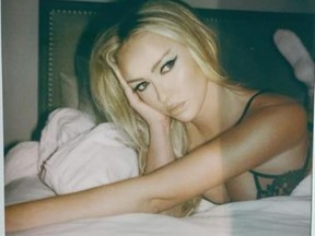 Paulina Gretzky shared a post of herself on a bed, enjoying a 'lazy weekend.'