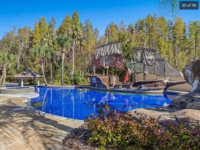A pool-based pirate ship is included in a Lutz, Fla. house that’s for sale. (Zillow photo)