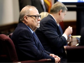 Gregory McMichael sits during opening statements in the trial of William "Roddie" Bryan, Travis McMichael and Gregory McMichael, charged with the February 2020 death of 25-year-old Ahmaud Arbery, at the Gwynn County Superior Court, in Brunswick, Georgia, U.S. November 5, 2021.