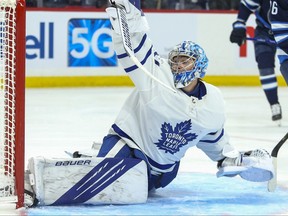 Toronto Maple Leafs goalie Joseph Woll (60) makes a save against the Winnipeg Jets.