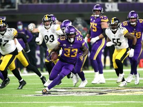 Dalvin Cook of the Minnesota Vikings carries the ball in the second quarter of the game against the Pittsburgh Steelers.