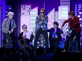SUGA, Jimin, RM, J-Hope and Jungkook of BTS perform onstage during the 62nd Annual GRAMMY Awards at Staples Center on January 26, 2020 in Los Angeles, California.