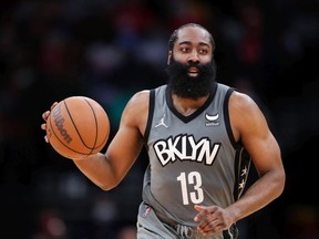 James Harden of the Brooklyn Nets controls the ball during the second half against the Houston Rockets at Toyota Center on December 08, 2021 in Houston, Texas.