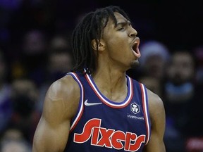 Tyrese Maxey of the Philadelphia 76ers celebrates during the fourth quarter against the Miami Heat at Wells Fargo Center on December 15, 2021 in Philadelphia, Pennsylvania.