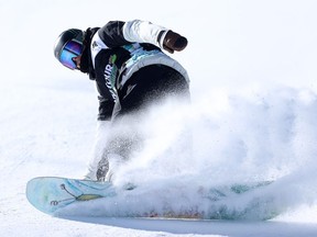 Zoi Sadowski Synnott of Team New Zealand slides into the finish area after her final run in the women's snowboard slopestyle final on Day 4 of the Dew Tour at Copper Mountain on December 18, 2021 in Copper Mountain, Colorado.