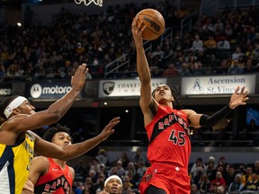 Toronto guard Dalano Banton (right) drives to the basket against Philadelphia guard Shake Milton (left) during a game in Toronto earlier in the season.